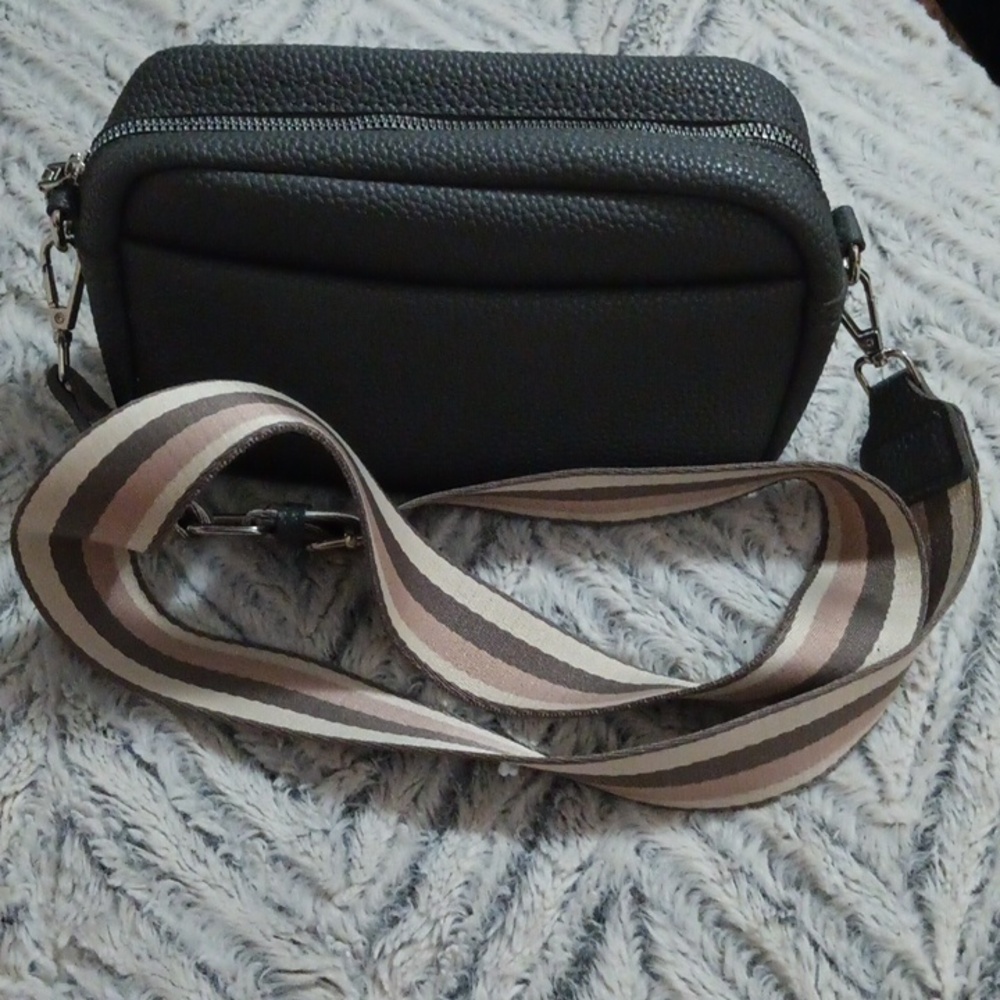 Grey with multi color brown strap.